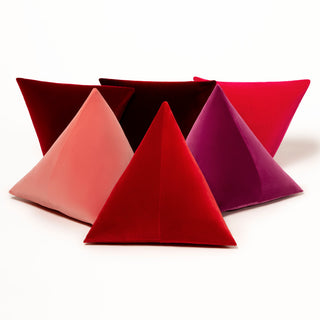 Shop our plum modern throw pillow, the BEIJA. Pyramid-shaped and handmade from the finest velvet and materials by skilled craftspersons in our Manhattan studio.