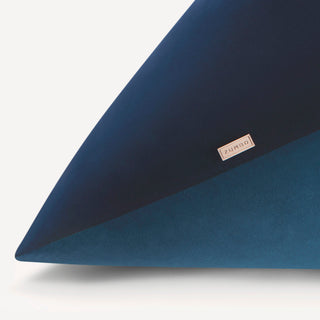 Shop our peacock blue modern throw pillow, the BEIJA BICOLOR. Pyramid-shaped and handmade from the finest velvet and materials by skilled craftspersons in our Manhattan studio.