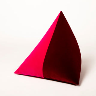 Shop our dark red modern throw pillow, the BEIJA BICOLOR. Pyramid-shaped and handmade from the finest velvet and materials by skilled craftspersons in our Manhattan studio.