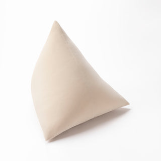 Shop our cream modern throw pillow, the BEIJA. Pyramid-shaped and handmade from the finest velvet and materials by skilled craftspersons in our Manhattan studio.