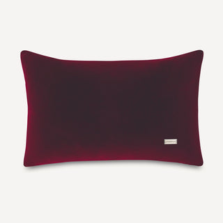 Shop our burgundy designer lumbar pillow, the BIANCA. Handmade from the finest velvet and materials by skilled craftspersons in our Manhattan studio.